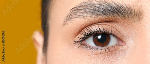 Woman with brown eyes on ye...
