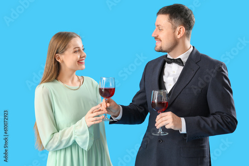 Elegant couple toasting wit...