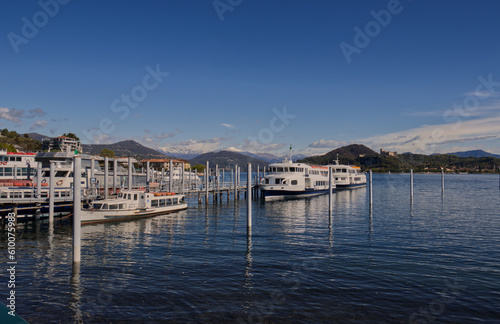 Boats for tourists docked at the port of Arona. © kevin