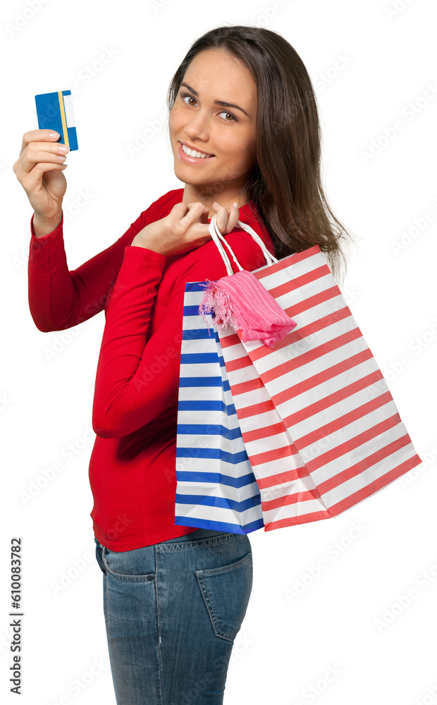 Young woman holding shopping bags and a credit card Young woman holding shopping bags and a credit card