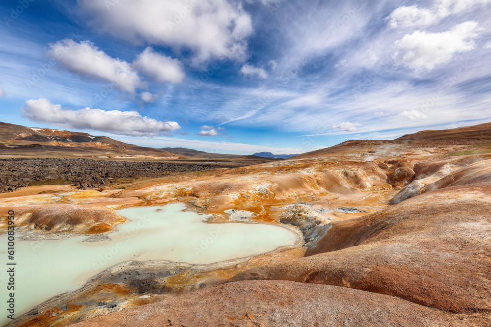 Breathtaking landscape of Acid hot lake with turquoise water in the geothermal valley Leirhnjukur.