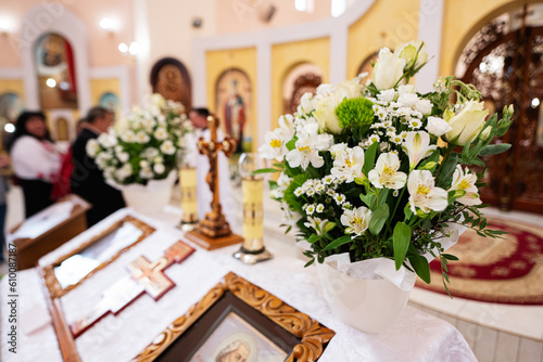 Bouquet of white flowers in the Orthodox church photo