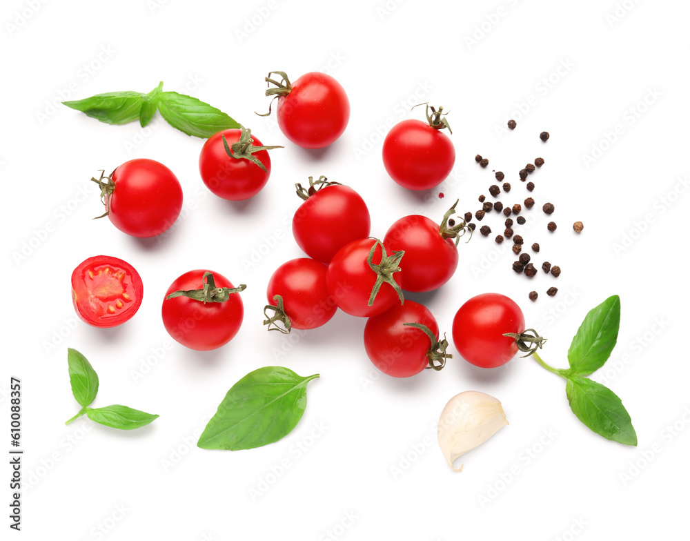 Composition with ripe cherry tomatoes and spices on white background