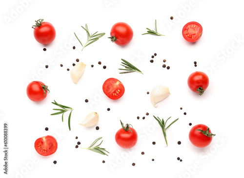 Composition with ripe cherry tomatoes and spices on white background © Pixel-Shot