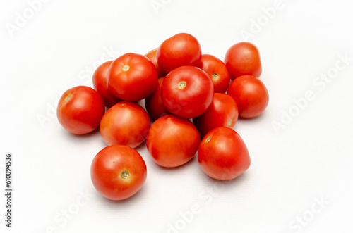 Fresh cocktail tomatoes isolated on white