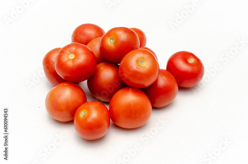 Fresh cocktail tomatoes isolated on white