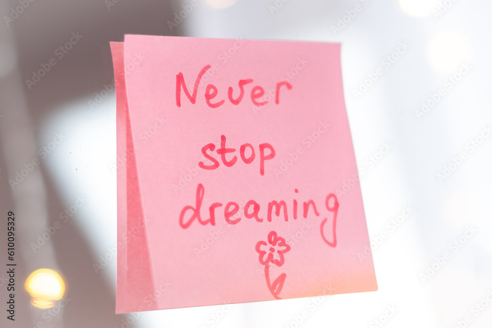 inspirational quotes on pink sticker on the mirror,handwriting text inspirational quotes on pink sticker on the mirror,handwriting text