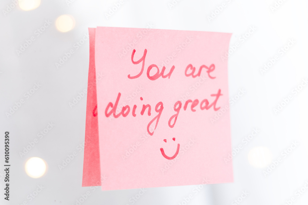 inspirational quotes on pink sticker on the mirror,handwriting text inspirational quotes on pink sticker on the mirror,handwriting text