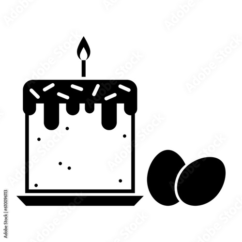 Easter cake with burning candle and eggs on white background
