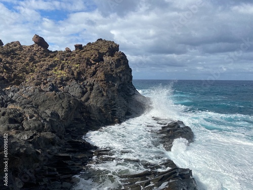 waves crashing on rocks