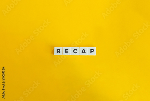 Recap Word on Letter Tiles on Yellow Background. Minimal Aesthetic.