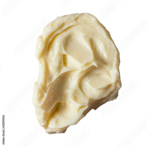 Dense body cream texture on transparent background. The color of the cream is light yellow.