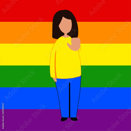 A woman in front of a rainbow LGBT flag in casual clothes with a blank poster in her hand. She extended her hand, gesture stop. The concept of protest, demonstration, fight for rights.
