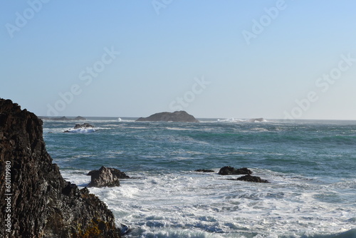 waves crashing on rocks