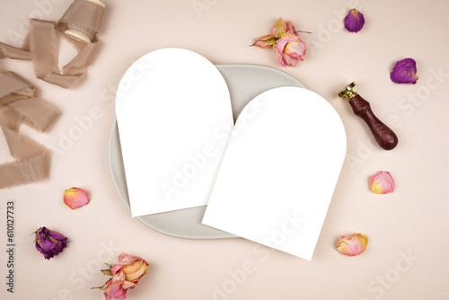 5x7 arch card wedding stationery suite mockup. Styled with silk ribbon, vintage wax seal and dried roses on a beige background. Double side two menu cards.