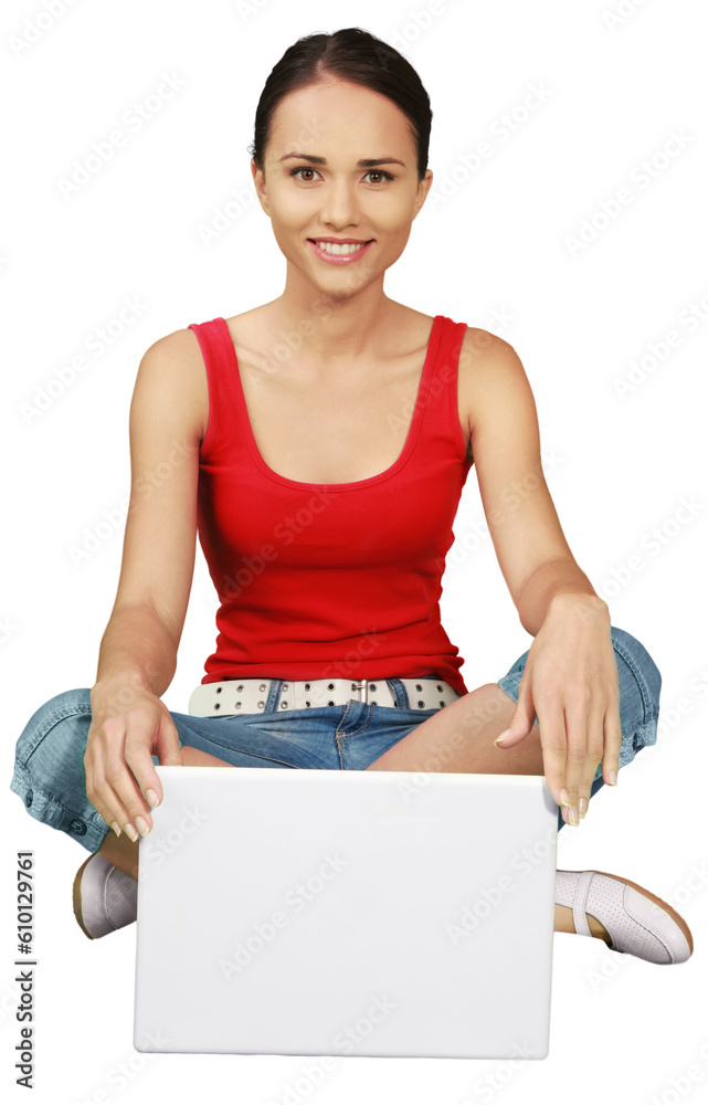 Friendly Woman Sitting Cross- Legged on Ground with Laptop - Isolated Friendly Woman Sitting Cross- Legged on Ground with Laptop - Isolated