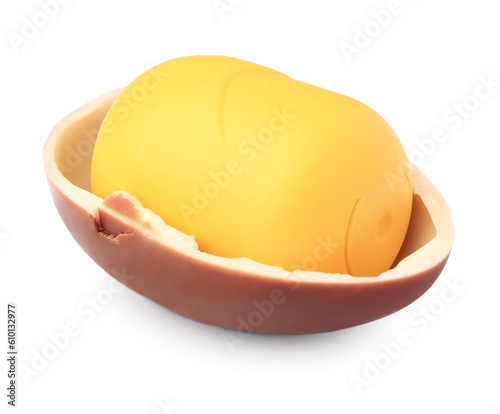 Slynchev Bryag, Bulgaria - May 25, 2023: Half of Kinder Surprise Egg and plastic capsule with toy on white background photo