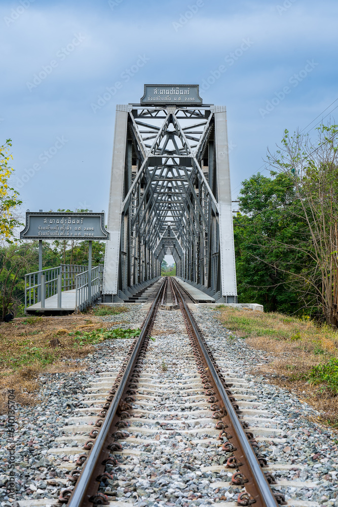Old railway iron bridge in countryside at Ban Dara, Pichai District, Uttaradit, Thailand. Name is Paramin Bridge also known as Baan Dara Bridge It is a railway bridge over the Nan River Old railway iron bridge in countryside at Ban Dara, Pichai District, Uttaradit, Thailand. Name is Paramin Bridge also known as Baan Dara Bridge It is a railway bridge over the Nan River