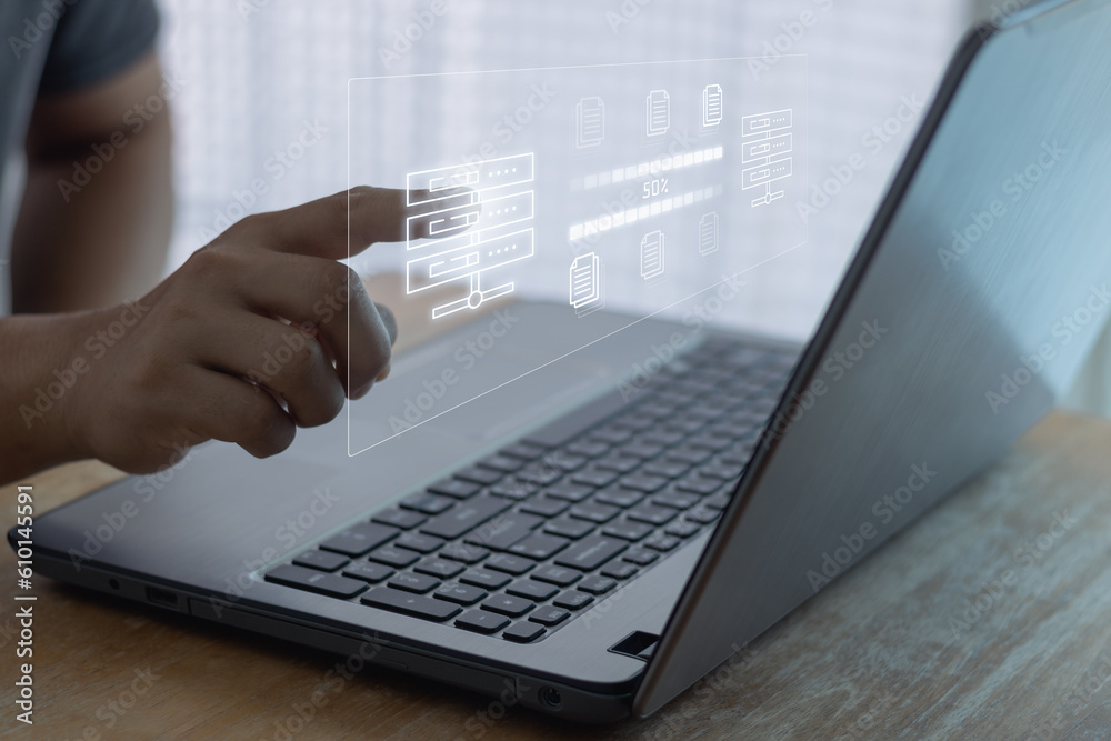 data transfer concept, File Transfer Protocol (FTP), internet server connection. Businessman hand using laptop computer with data host server storage icon for information exchange and transfer concept data transfer concept, File Transfer Protocol (FTP), internet server connection. Businessman hand using laptop computer with data host server storage icon for information exchange and transfer concept