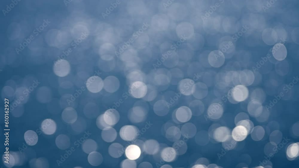 Sun Sparkles Bokeh On Blue Ocean Water