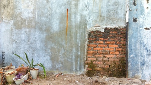 Wall for writing and drawing space, partially visible red brick arrangement