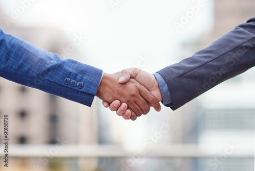 Handshake, business teamwork and people of city with success, staff agreement and partnership. Closeup of team, collaboration and deal of workers in support, greeting and welcome with shaking hands