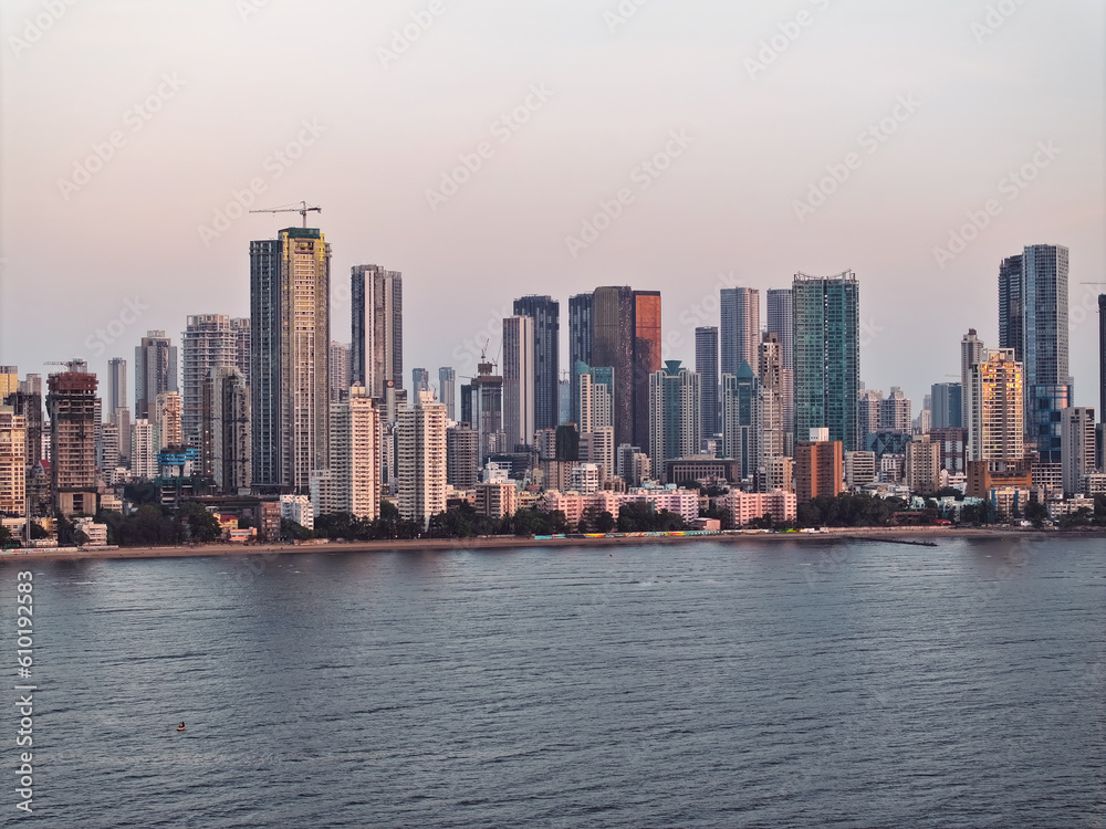 Fototapeta premium Modern City high-rise skyscraper buildings. Aerial drone view of the Financial District in Mumbai. Daytime Mumbai City, India