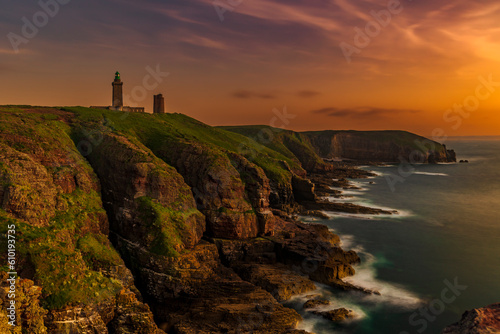 Lighthouse at sunset. Long exposure landscape of the lighthouse of Cap Fréhel, in the Côtes d'Armor, at sunset.
