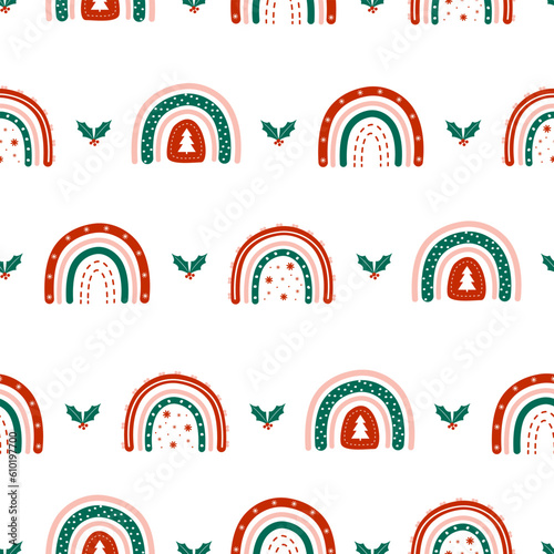 Christmas seamless pattern with rainbows and holly berry leaves. Cute winter background in boho style. Vector childish illustration for posters, textile, fabric, wrapping paper.