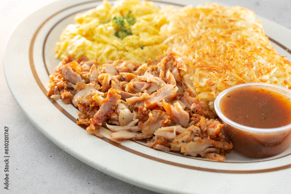A view of a chicken shawarma breakfast. A view of a chicken shawarma breakfast.