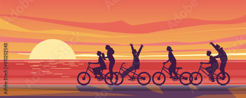 Groups of children ride bicycles on the beach having fun in summer time vacation.