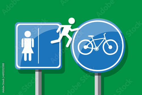 Pictogram of a man from a restroom sign jumping onto a bike path sign.