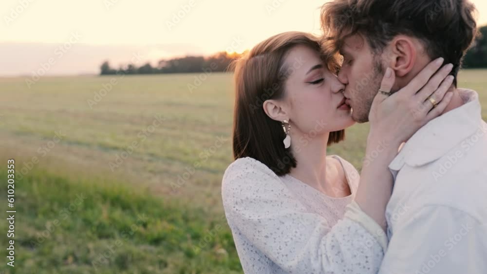 couple in love at sunset in white clothes hugging. Engagement and wedding. couple in love at sunset in white clothes hugging. Engagement and wedding.