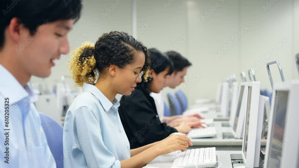 Multinational operator group working in the office. Call center. Customer support staff. Multinational operator group working in the office. Call center. Customer support staff.