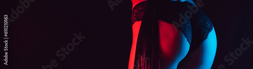 Slika na platnu Sexy big ass girl in Lacy black panties with leather whip