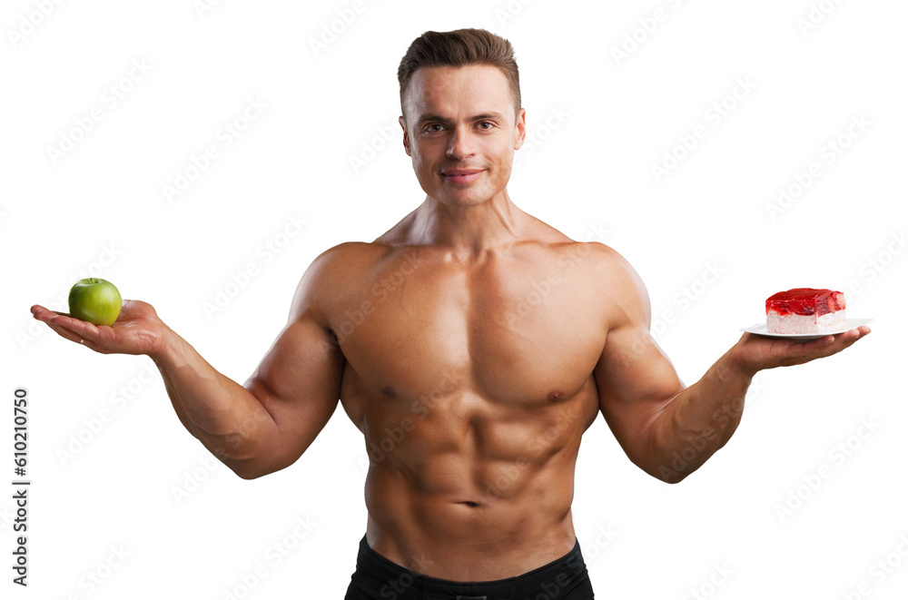 A young man muscular holds healthy and unhealthy food, diet healthy concept A young man muscular holds healthy and unhealthy food, diet healthy concept