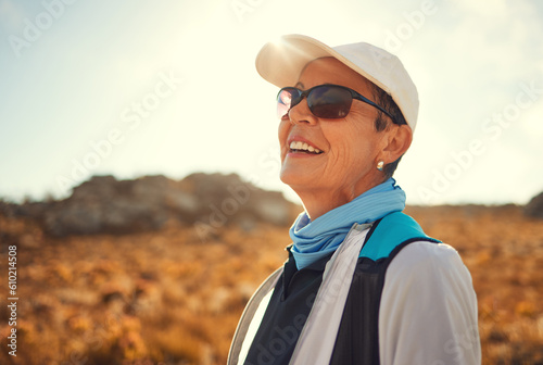 Relax, hiking and thinking with old woman in nature for wellness, fitness and retirement. Happy, freedom and travel with senior hiker trekking in outdoors for environment, adventure and summer