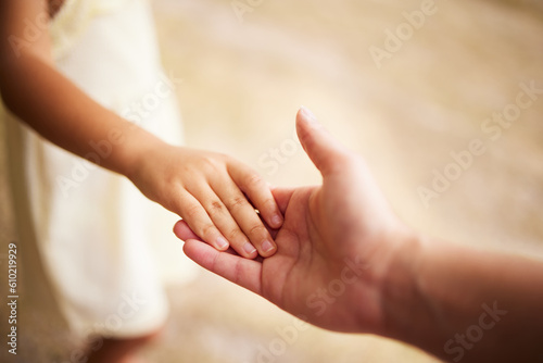Obraz na plátně Love, closeup with person with their child and holding hands for support