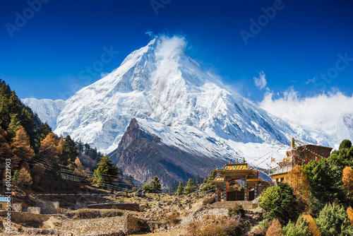 Himalaya scenic mountain landscape against the blue sky. Manaslu mountain