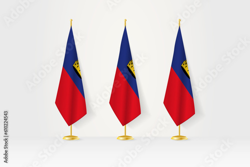 Three Liechtenstein flags in a row on a golden stand, illustration of press conference and other meetings.