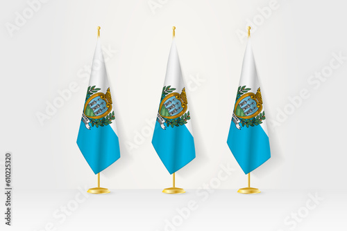 Three San Marino flags in a row on a golden stand, illustration of press conference and other meetings.