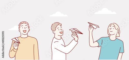 people posing with paper airplane. Hand drawn style vector design illustrations.