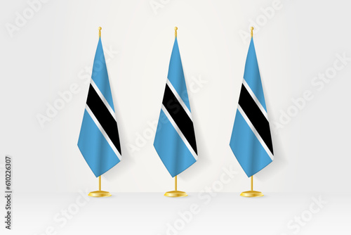 Three Botswana flags in a row on a golden stand, illustration of press conference and other meetings.