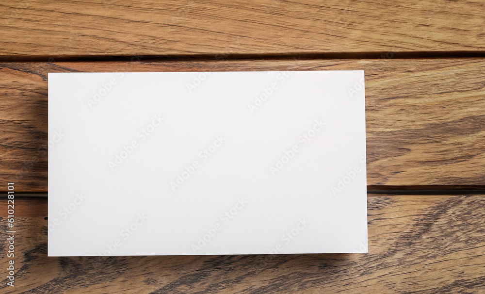 stacked business card on a wooden desk mock up template design. stacked business card on a wooden desk mock up template design.