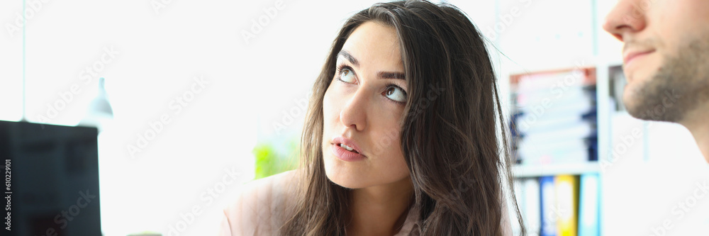 Young male and female interns look up at boss in office. Getting clarifications on work and learning concept Young male and female interns look up at boss in office. Getting clarifications on work and learning concept