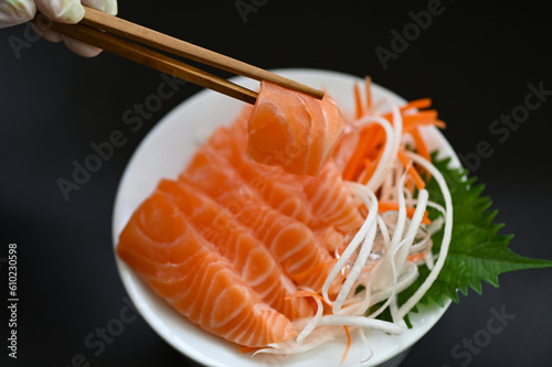 fresh raw salmon fish for cooking food seafood salmon fish, salmon sashimi food salmon fillet japanese menu with shiso perilla leaf lemon herb and spices