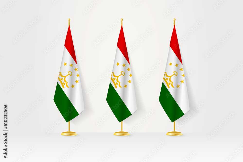 Three Tajikistan flags in a row on a golden stand, illustration of press conference and other meetings. Three Tajikistan flags in a row on a golden stand, illustration of press conference and other meetings.