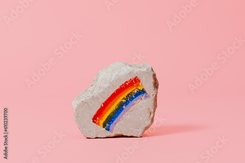 rainbow flag on a rock photo