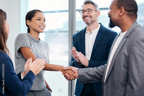 Business people, handshake and clapping in meeting celebration, success promotion or HR thank you. Corporate partnership, woman shaking hands and b2b onboarding, congratulations or career welcome