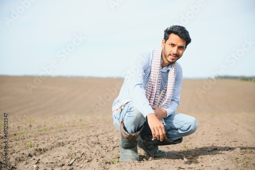 Young Indian farmer in his field